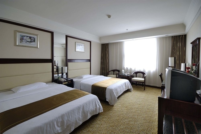Imagen de la habitación del Hotel HNA Downtown. Foto 5