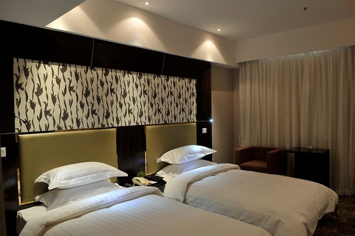 Imagen de la habitación del Hotel HNA Downtown. Foto 6