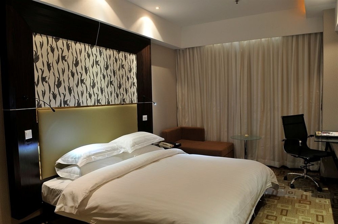 Imagen de la habitación del Hotel HNA Downtown. Foto 7