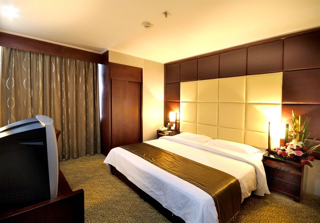 Imagen de la habitación del Hotel HNA Downtown. Foto 8