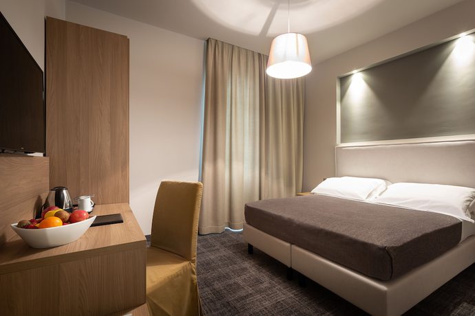 Imagen de la habitación del Hotel HNN Luxury Suites. Foto 4