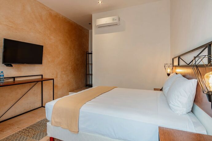 Imagen de la habitación del Hotel HO Merida. Foto 15