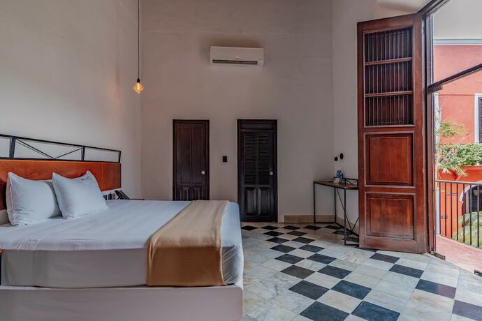 Imagen de la habitación del Hotel HO Merida. Foto 16