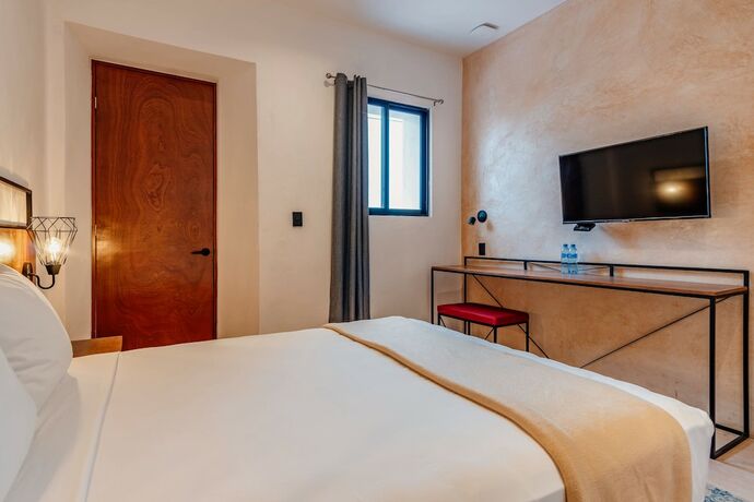 Imagen de la habitación del Hotel HO Merida. Foto 17