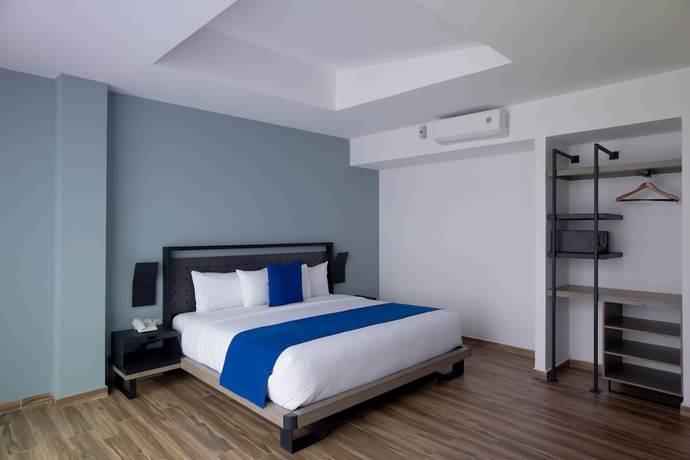 Imagen de la habitación del Hotel HOH. Foto 10