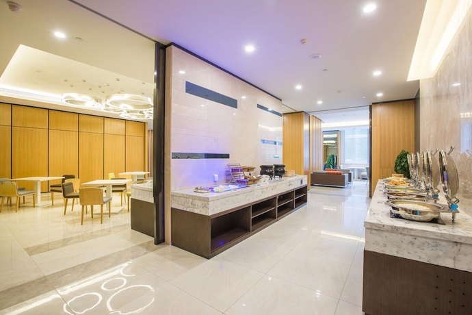 Imagen del bar/restaurante del Hotel HOLIDAY INN EXPRESS BENGBU DOWNTOWN. Foto 5