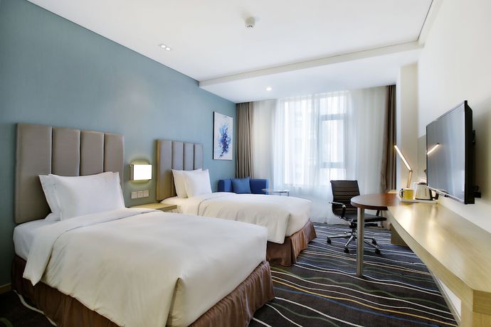 Imagen de la habitación del Hotel HOLIDAY INN EXPRESS LANGFANG PARK VIEW. Foto 11