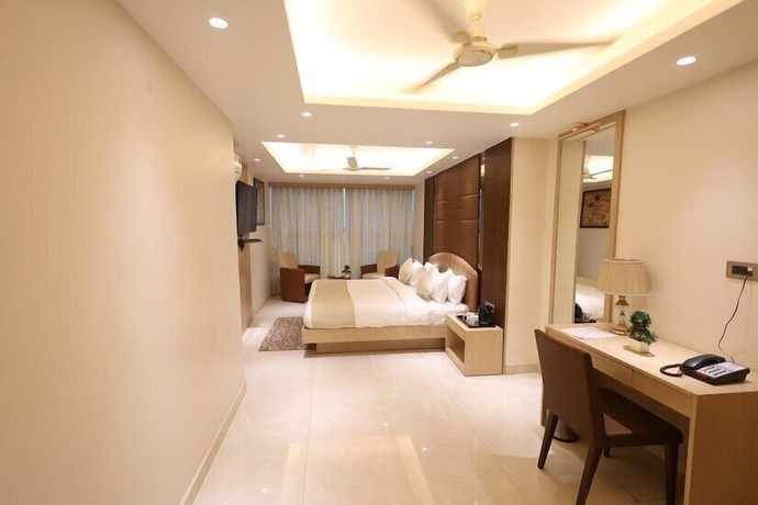 Imagen de la habitación del Hotel HOMANSH GALAXY HOTEL. Foto 7