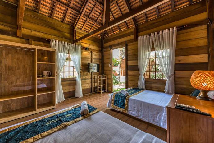 Imagen de la habitación del Hotel HON BA LAGI BEACH RESORT. Foto 11