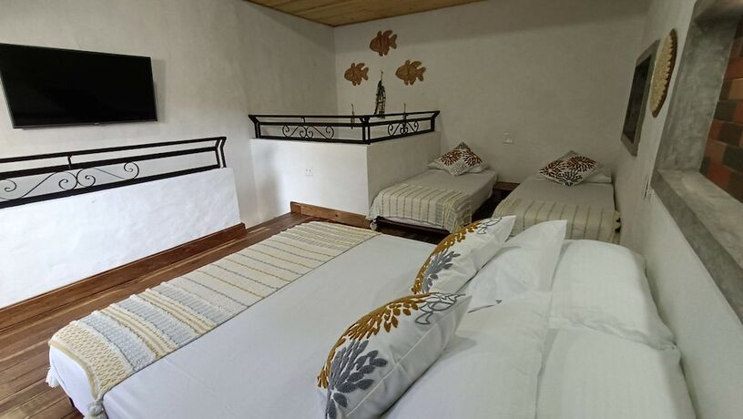 Imagen de la habitación del Hotel HONDA COLONIAL MAGDALENA RESORT. Foto 15