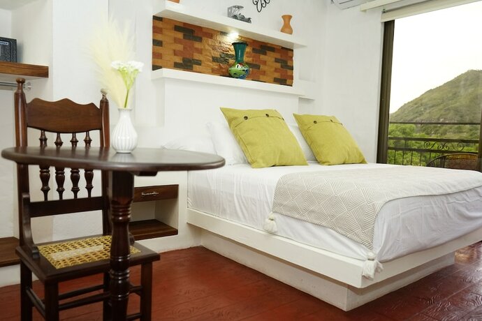 Imagen de la habitación del Hotel HONDA COLONIAL MAGDALENA RESORT. Foto 20