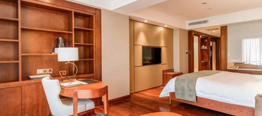 Imagen de la habitación del Hotel HONGGANG YANGSHENG THEMED HOTEL. Foto 1