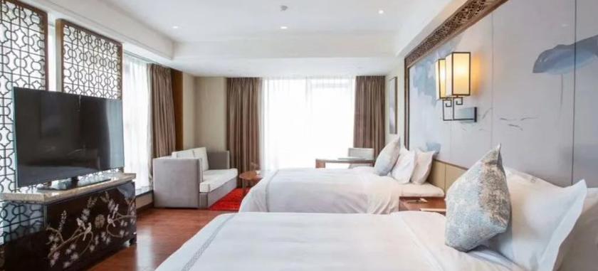 Imagen de la habitación del Hotel HONGGANG YANGSHENG THEMED HOTEL. Foto 6