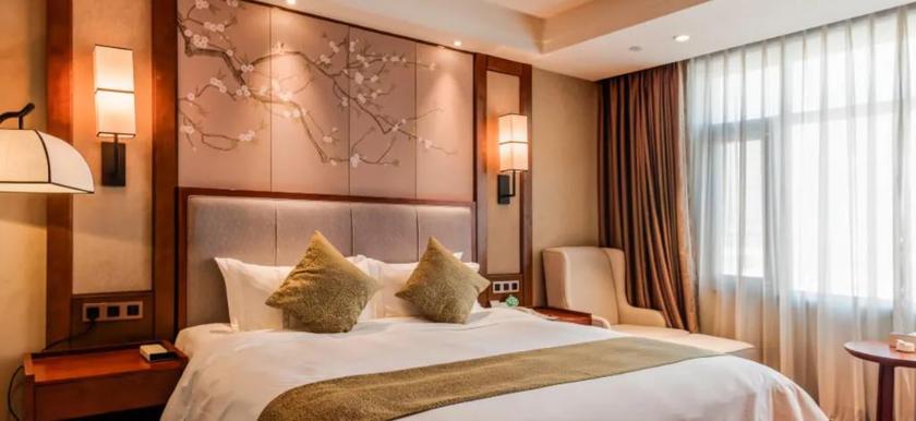 Imagen de la habitación del Hotel HONGGANG YANGSHENG THEMED HOTEL. Foto 13