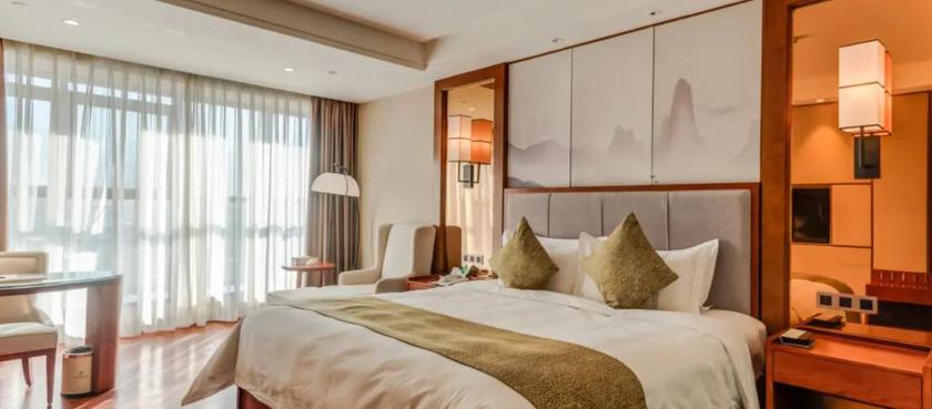 Imagen de la habitación del Hotel HONGGANG YANGSHENG THEMED HOTEL. Foto 17