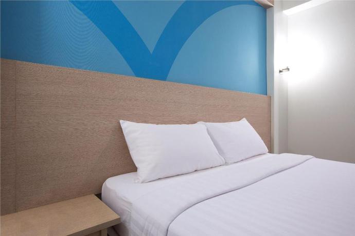 Imagen de la habitación del Hotel HOP INN HOTEL TOMAS MORATO QUEZON CITY. Foto 16