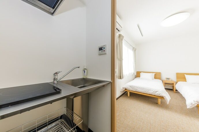 Imagen de la habitación del Hotel HOPETREE KYOTO. Foto 17