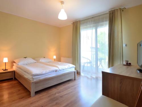 Imagen de la habitación del Hotel HORN Jastarnia. Foto 17