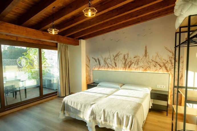 Imagen de la habitación del Hotel HOSTAL BOUTIQUE CAZORLA BAKERY. Foto 7