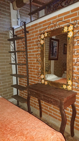 Imagen de la habitación del Hotel HOSTAL EL REFUGIO. Foto 9