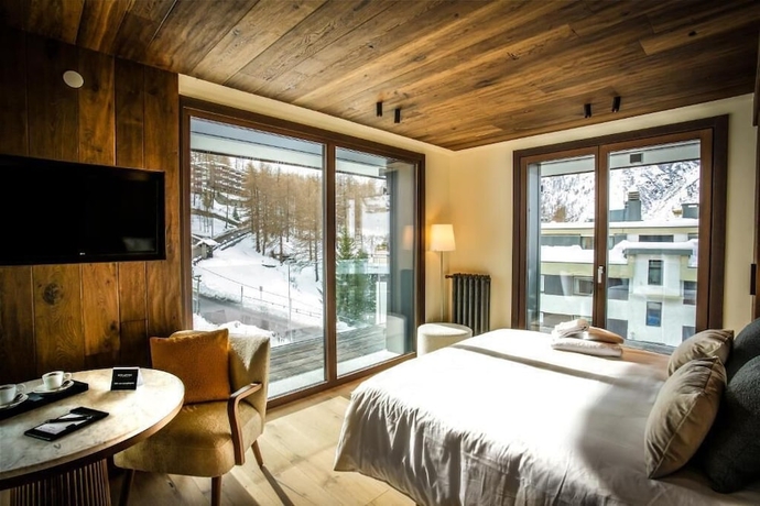 Imagen de la habitación del Hotel HOTEL AL PIOLET. Foto 8