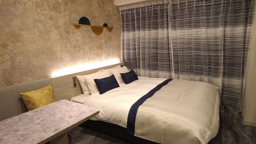 Imagen de la habitación del Hotel HOTEL AMANEK Kumamoto. Foto 3