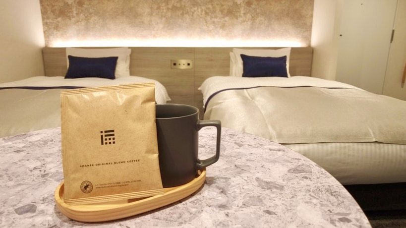 Imagen de la habitación del Hotel HOTEL AMANEK Kumamoto. Foto 4