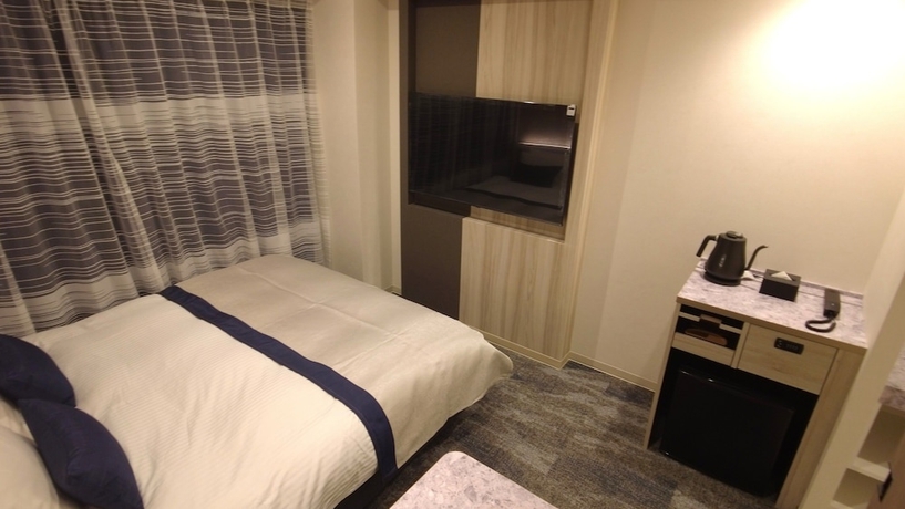 Imagen de la habitación del Hotel HOTEL AMANEK Kumamoto. Foto 10