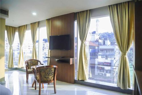 Imagen general del Hotel HOTEL APOLLO GRAND A UNIT OF SATYAM ASSOCIATES. Foto 7