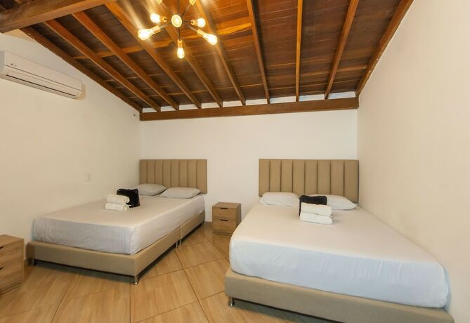 Imagen de la habitación del Hotel HOTEL BALI AT POBLADO. Foto 12