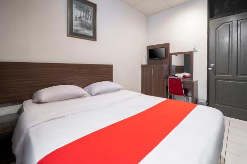 Imagen de la habitación del Hotel HOTEL BALI MAKASSAR. Foto 18