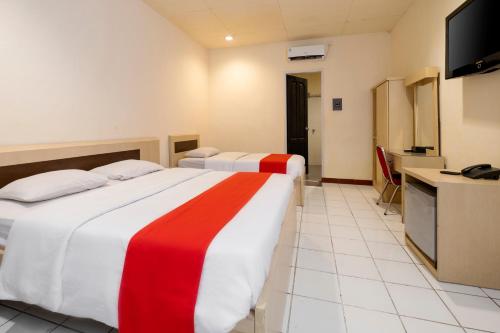 Imagen de la habitación del Hotel HOTEL BALI MAKASSAR. Foto 20
