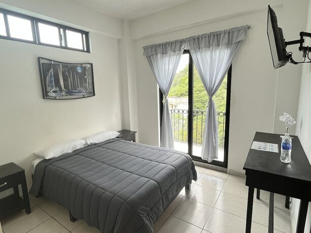Imagen de la habitación del Hotel HOTEL BOUTIQUE ARBOL DE LA VIDA. Foto 19