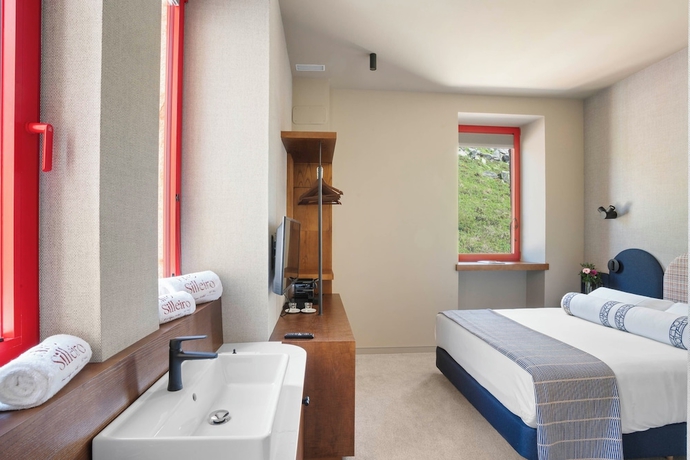 Imagen de la habitación del Hotel HOTEL BOUTIQUE FARO SILLEIRO. Foto 2