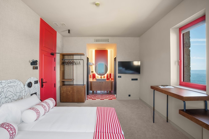 Imagen de la habitación del Hotel HOTEL BOUTIQUE FARO SILLEIRO. Foto 4