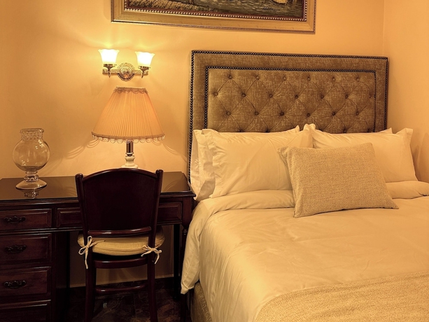 Imagen de la habitación del Hotel HOTEL BOUTIQUE PATIO ANDALUZ. Foto 4