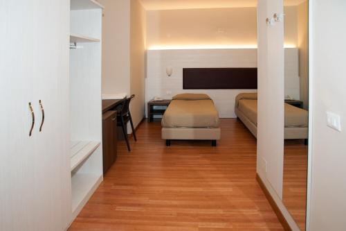 Imagen de la habitación del Hotel HOTEL BUCA DI BACCO. Foto 4