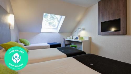 Imagen de la habitación del Hotel HOTEL CAMPANILE GENEVE - Aeroport/Palexpo. Foto 17