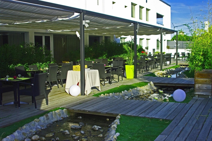 Imagen del bar/restaurante del Hotel HOTEL CAMPANILE MONTPELLIER OUEST - Croix d'Argent. Foto 3