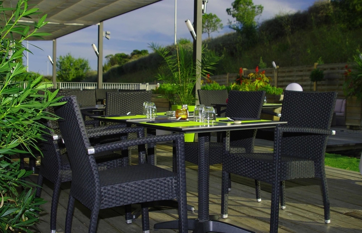 Imagen del bar/restaurante del Hotel HOTEL CAMPANILE MONTPELLIER OUEST - Croix d'Argent. Foto 6