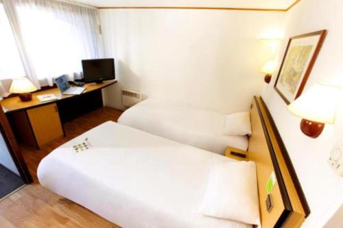 Imagen de la habitación del Hotel HOTEL CAMPANILE NATURE - MOULINS AVERMES. Foto 15
