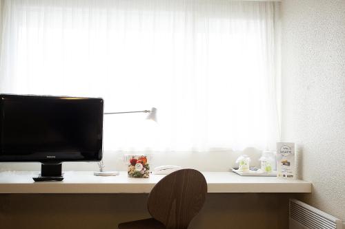 Imagen general del Hotel HOTEL CAMPANILE NIMES SUD - Caissargues. Foto 5