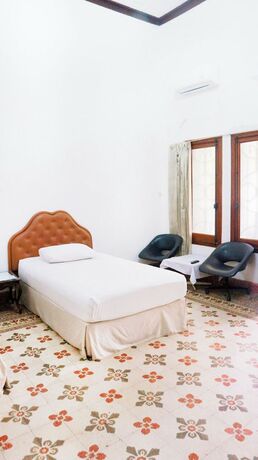 Imagen de la habitación del Hotel HOTEL CANDI BARU. Foto 19