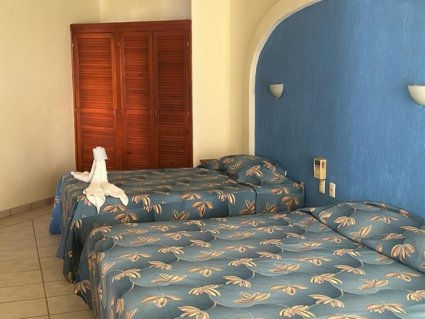 Imagen de la habitación del Hotel HOTEL CASTILLO DEL MAR, Playa del Carmen. Foto 15