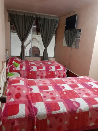 Imagen de la habitación del Hotel HOTEL CENTRAL, Latacunga. Foto 7
