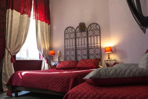 Imagen de la habitación del Hotel HOTEL CHEZ LOUISETTE. Foto 15