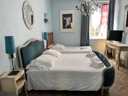 Imagen de la habitación del Hotel HOTEL CHEZ LOUISETTE. Foto 16