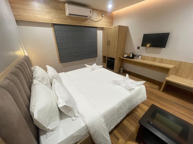 Imagen de la habitación del Hotel HOTEL COSMOS, Bhubaneshwar. Foto 7