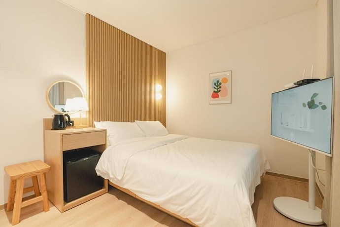 Imagen de la habitación del Hotel HOTEL DAUN GURI. Foto 14