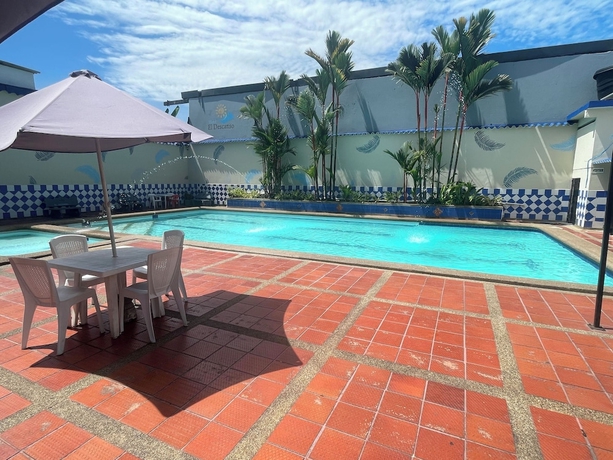 Imagen de la piscina del Hotel HOTEL DESCANSO INN VILLAVICENCIO. Foto 14